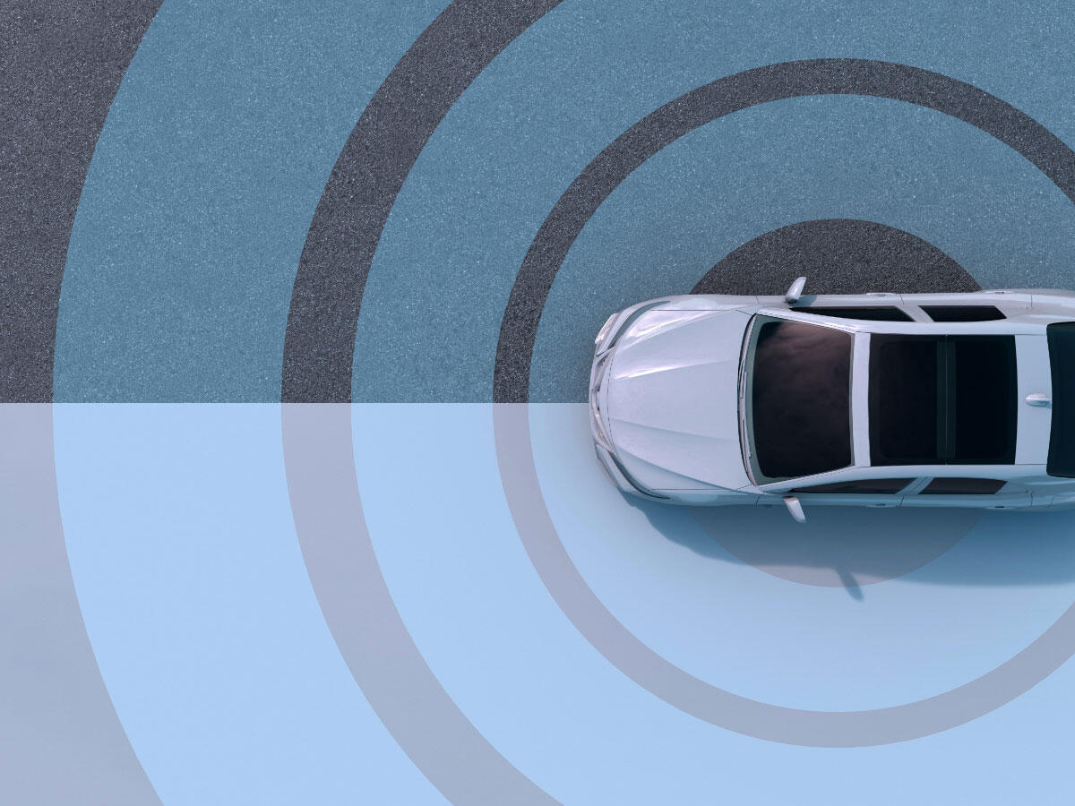 An overhead view of a white automobile