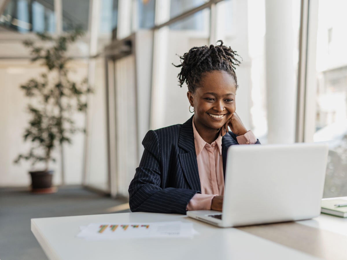 A person listening to a webinar