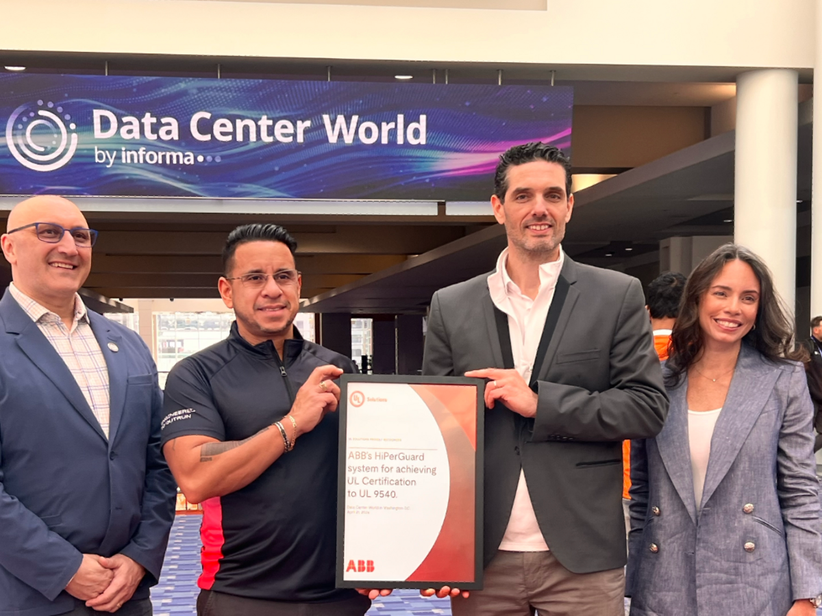 Group holding a certificate at Data Center World 2026