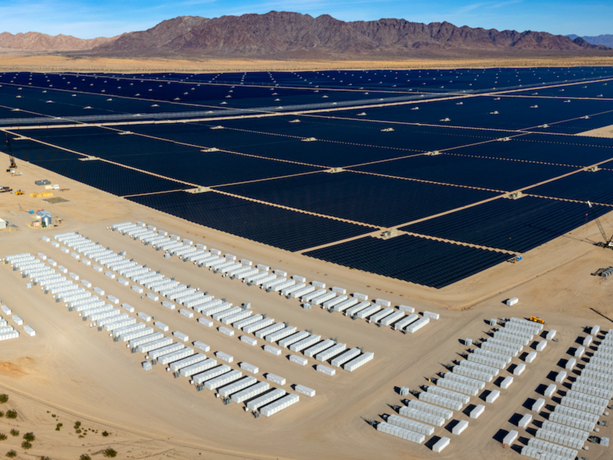 Battery energy storage system next to solar farm in the desert