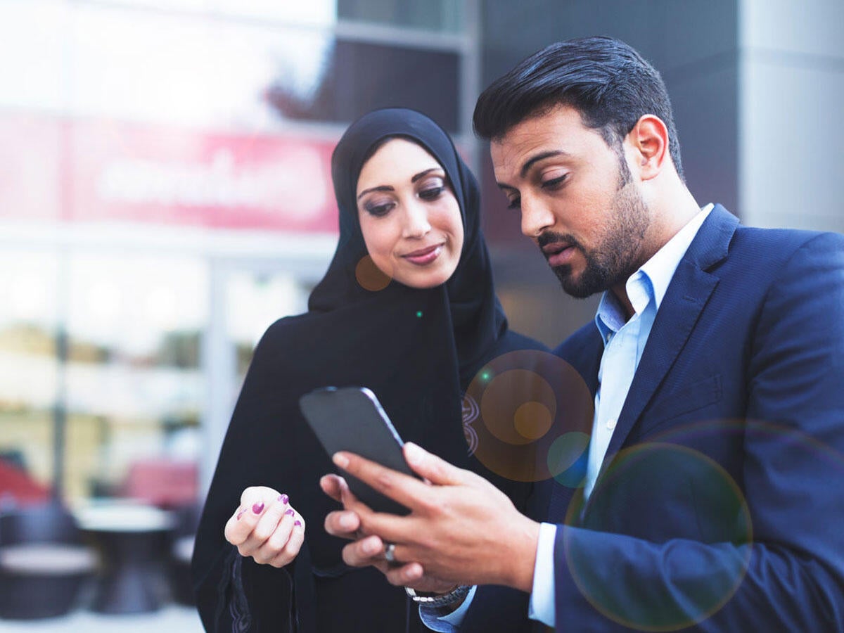 A person sharing information on a cellphone