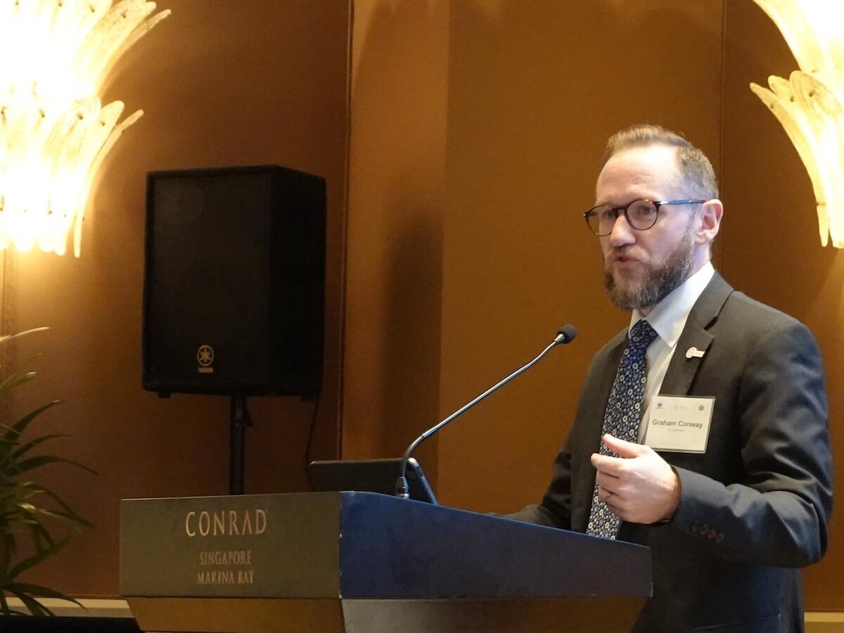 Dr. Graham Conway speaking at an APEC workshop in Singapore