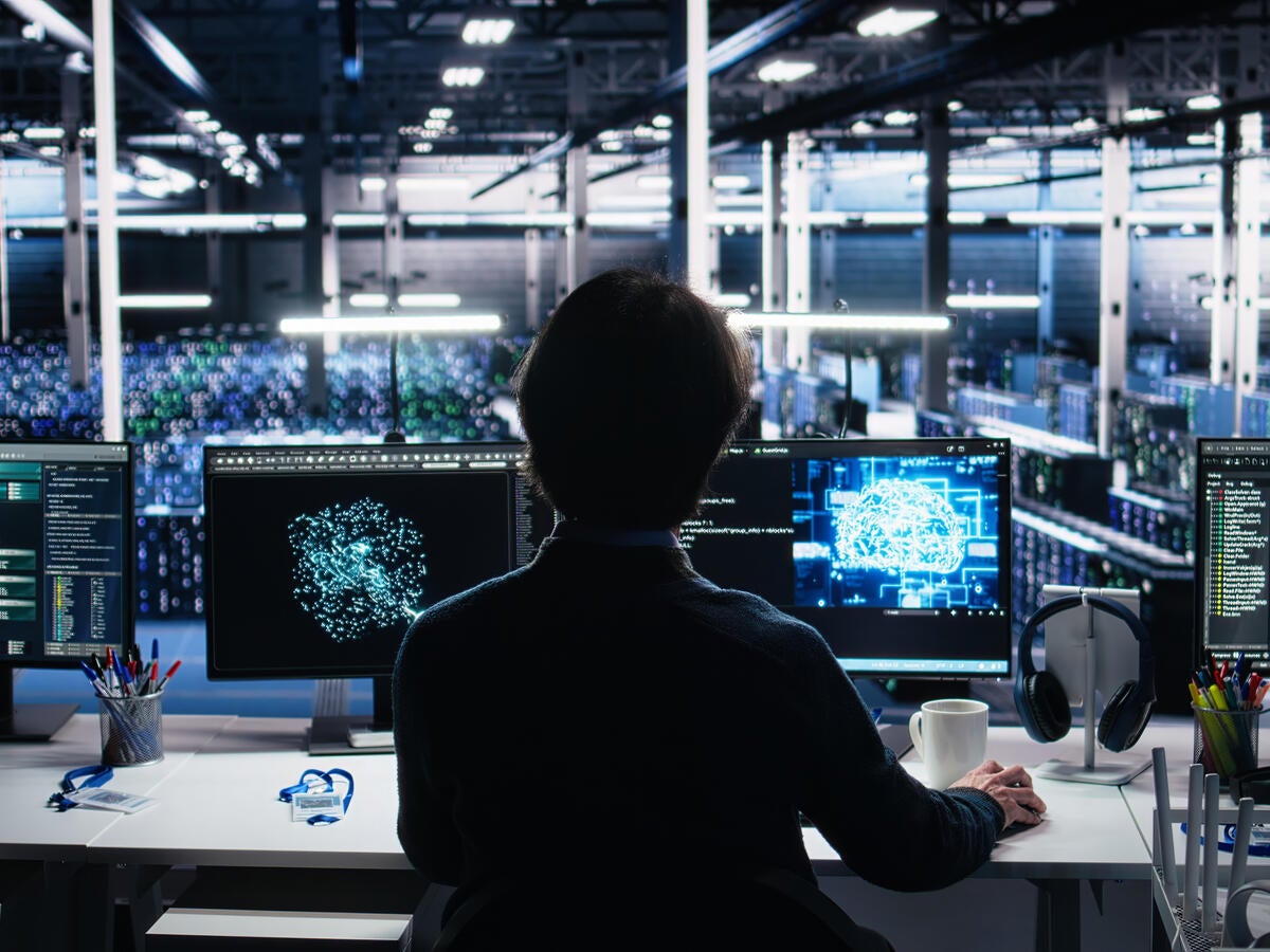 person watching computer screens