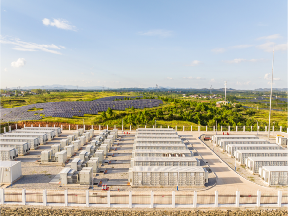 Outside modular data center in front of a solar array
