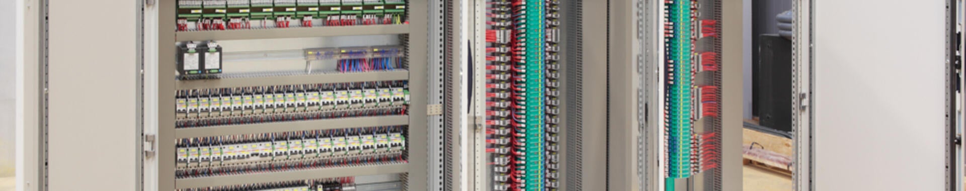 The inside of an industrial control panel board.