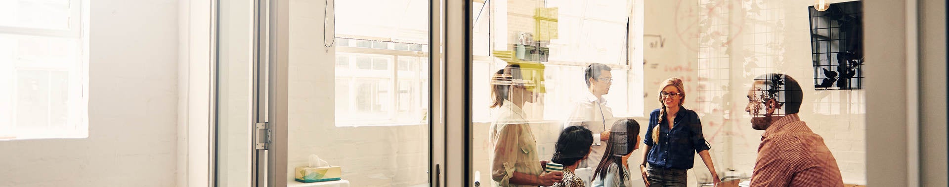 Six people having a meeting