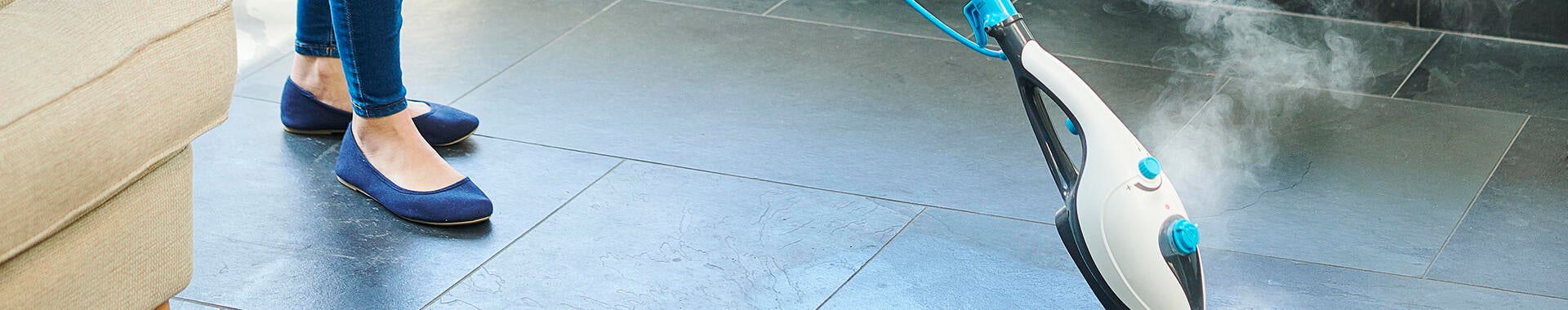 Steam cleaner mop cleaning a floor