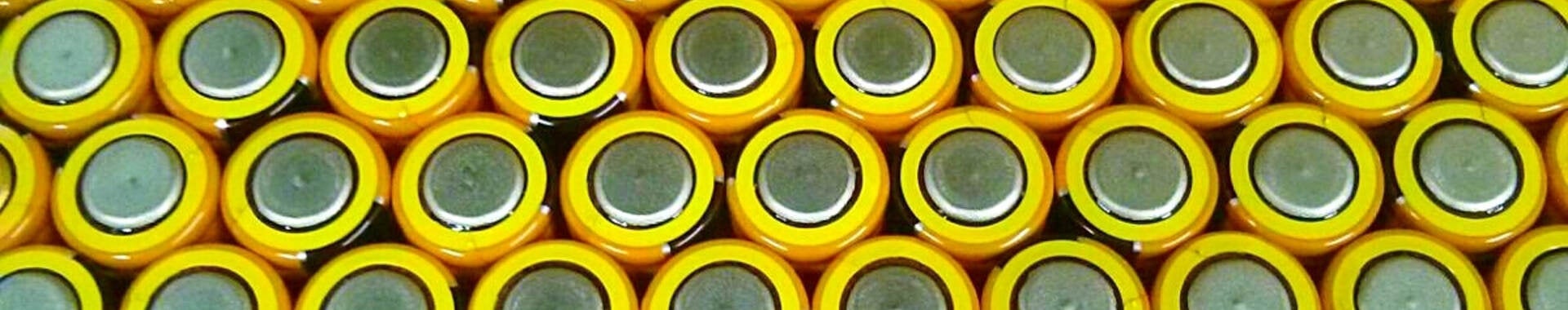 Close up of the bottoms of batteries
