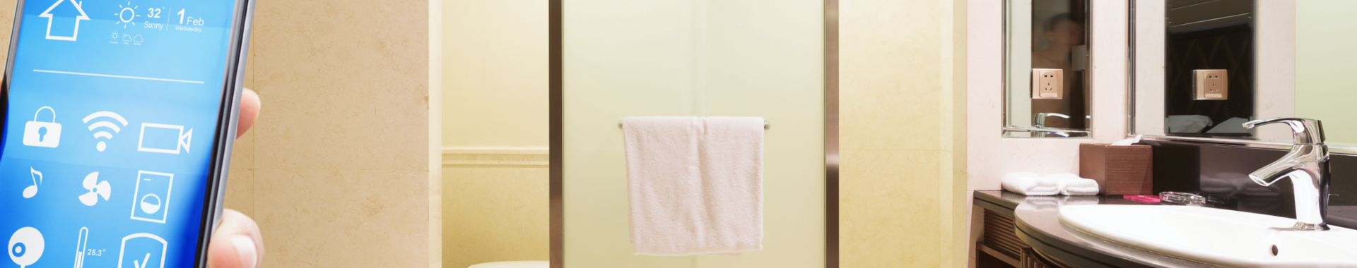 A hand holds a smartphone while in a modern bathroom