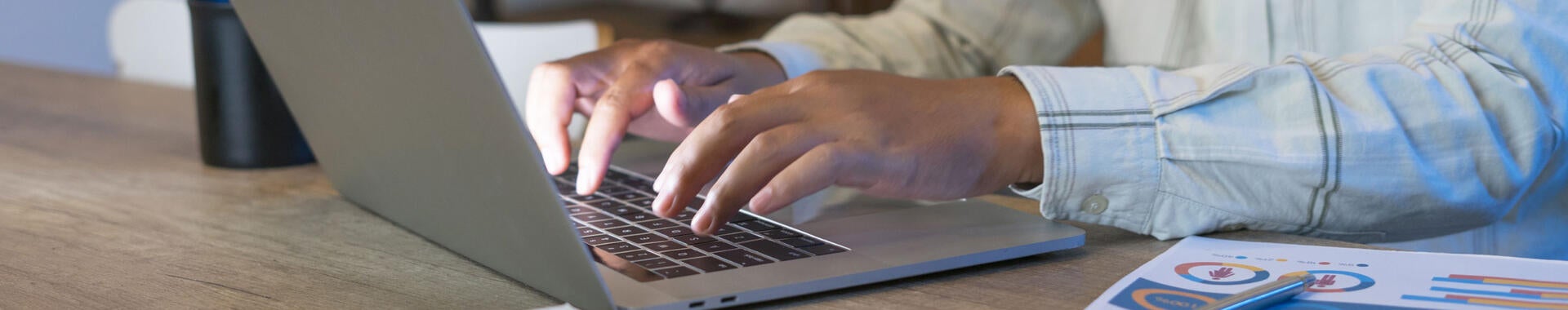 Person working on a laptop