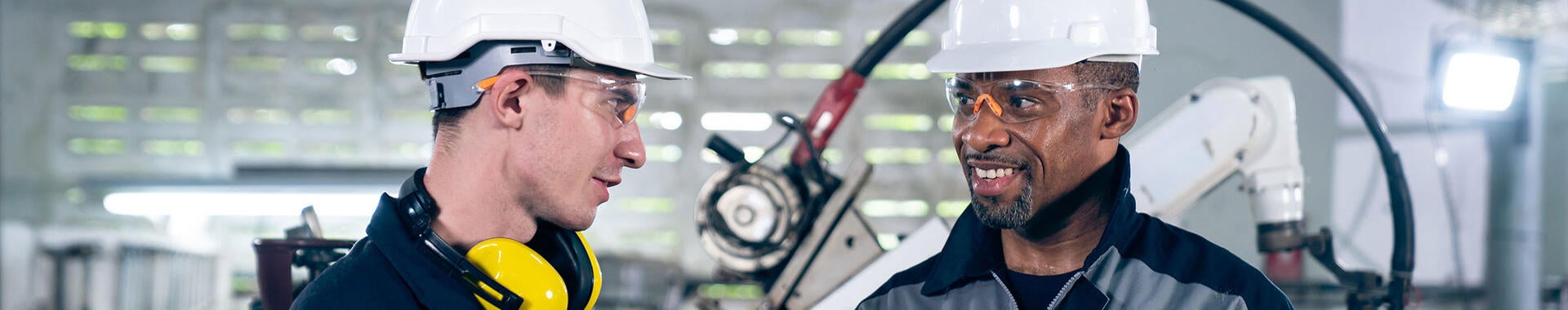 Two colleagues looking at tablet