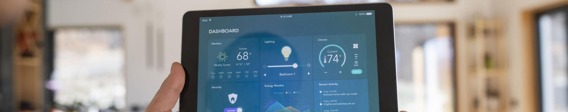 A person looking at a smart home app on a tablet