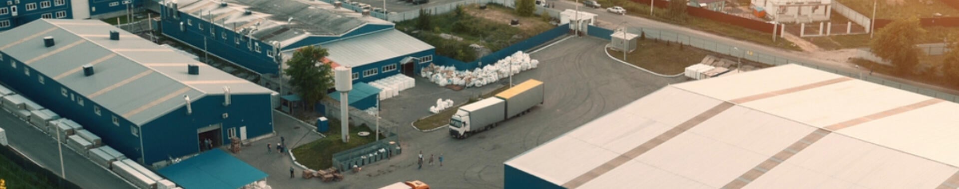 Overhead view of a factory at sunrise