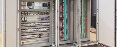 The inside of an industrial control panel board.