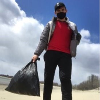 UL employee with trash pick up in Carson Beach South Boston