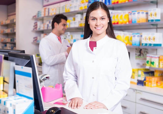 medical assistant standing in a medical records room