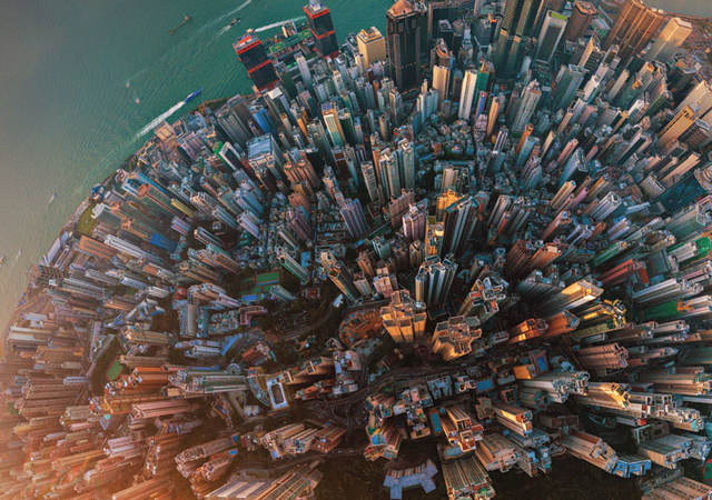 Aerial view of city with tall buildings
