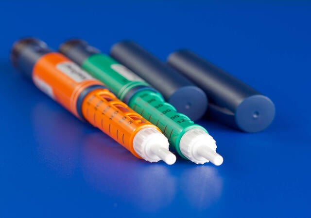 image of colorful syringes used for dispensing pharmaceuticals