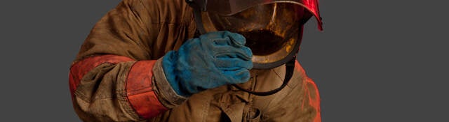 Firefighter wearing unclean gear