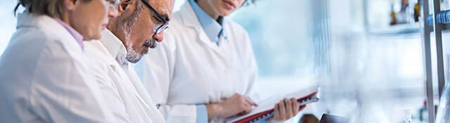 Photo of doctors analyzing data