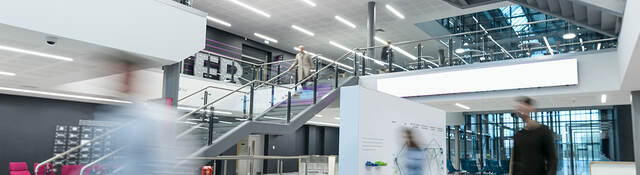 People enjoying the smart features of a building. 