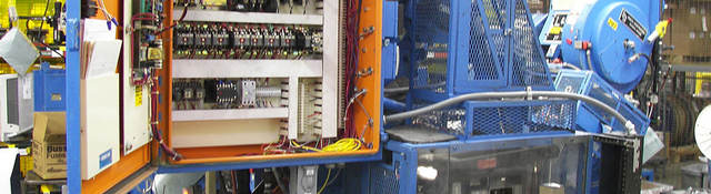 Industrial machinery with open control panel