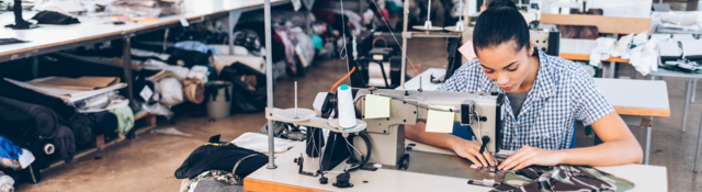 Tailor working in clothing factory