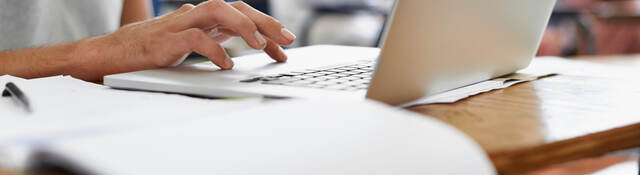 man using a laptop computer