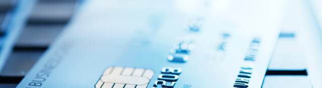a credit card on a keyboard