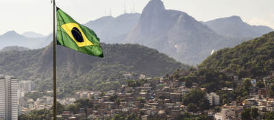 View of Brazil and waving Brazilian flag	