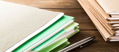 Stack of manila document folders