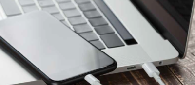 Phone on top of laptop keyboard