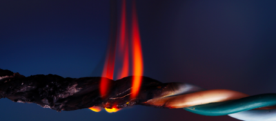 Close up of wire cable that is burning