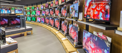 A wall of TVs in an electronics store. 