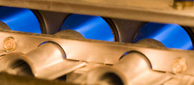 Close up of gas burning residential furnace jets