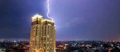 lightning striking building