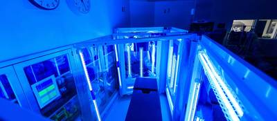 Hospital examination table being treated with UV light for sterilization
