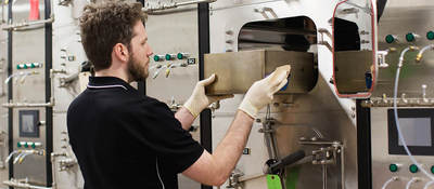Man conducting Prop 65 chemical emissions testing 