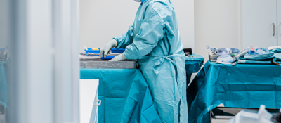 Female doctor in hospital preparing for surgery.