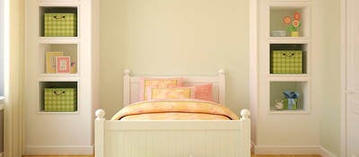 Child’s bedroom with bed and bookshelves