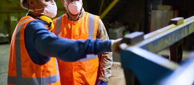 Factory working wearing PPE