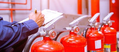 Photo of Engineer checking Industrial fire control system