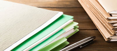 Stack of files on desk