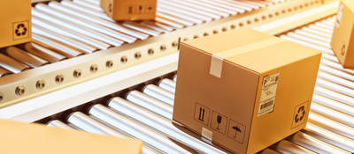 Cardboard boxes on conveyor belt 