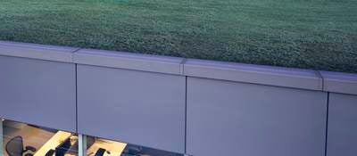 An innovative office building with greenscape on the roof.