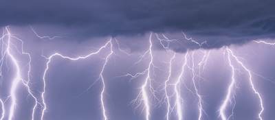 Lightning strikes across horizon