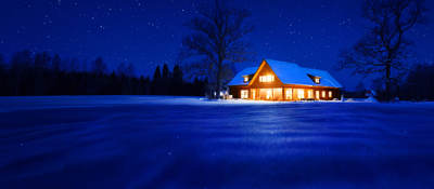 Residential home, lit up at night