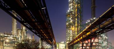 Pipelines at refinery at night