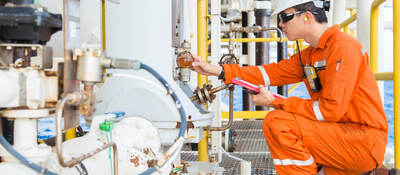 Engineer inspecting hazardous locations equipment