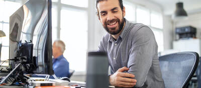 businessman using digital speaker at office